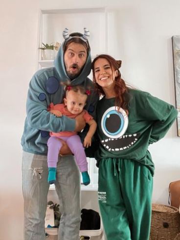 Melanie with her husband Alex and daughter Mia